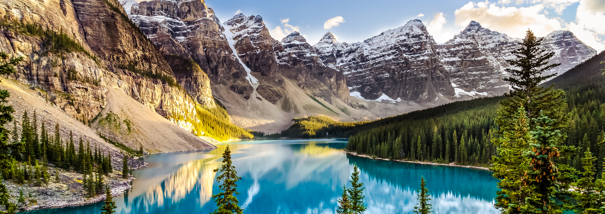 Rocky mountains, blue lake, green trees