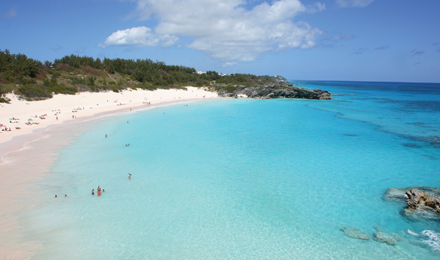 Clear blue water and white sand in Horseshoe Bay in Bermuda