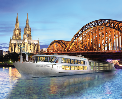 Emerald Waterways ship under a bridge in the river