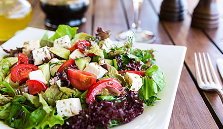 Tasty Greek salad with fresh tomatoes and cheese