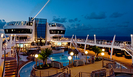 MSC Cruises sun deck with pool, decorative palm trees and overlook deck